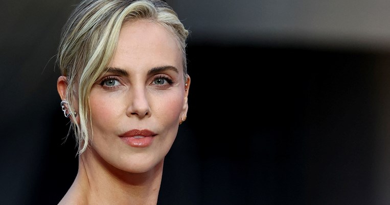 Σαρλίζ Θέρον, pre olympics party