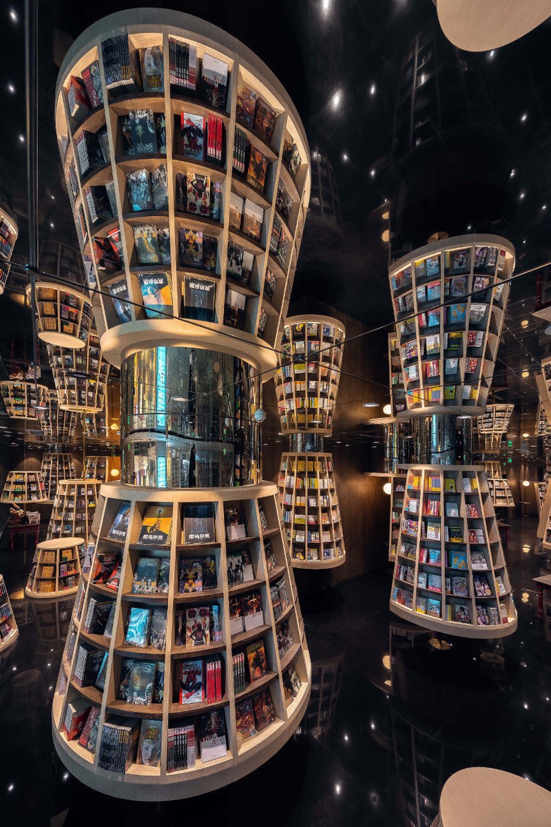 Φαντασμαγορικό και ονειρικό: Μέσα στο ρετροφουτουριστικό σύμπαν ενός βιβλιοπωλείου που θυμίζει Έσερ